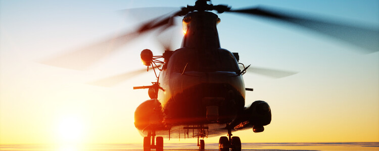 Apache helicopter on tarmac at sunset AlBeMet application