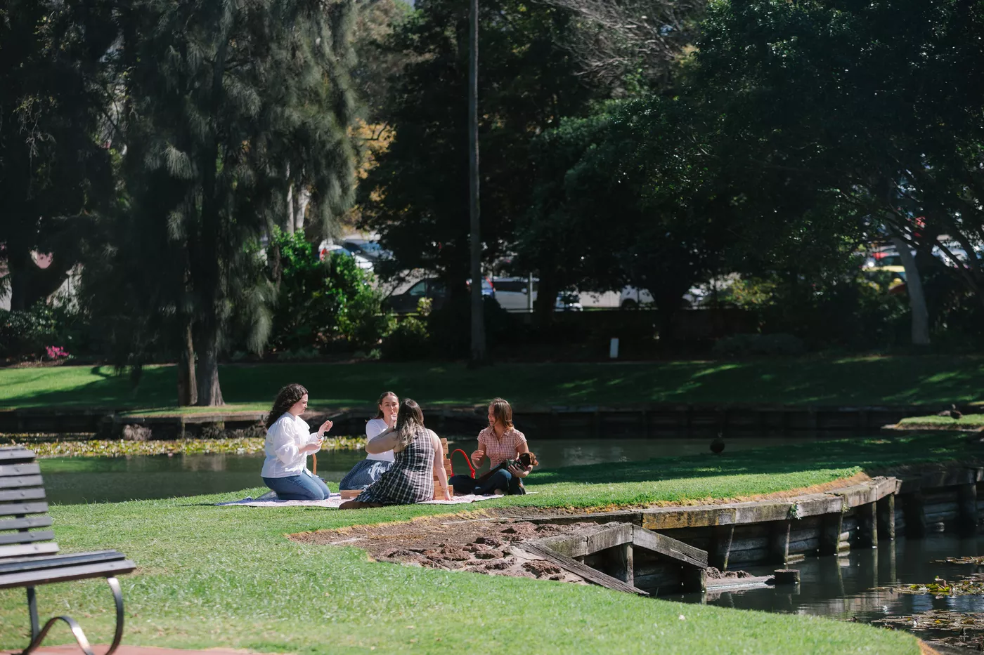 People enjoying a picnic at Queens Gardens