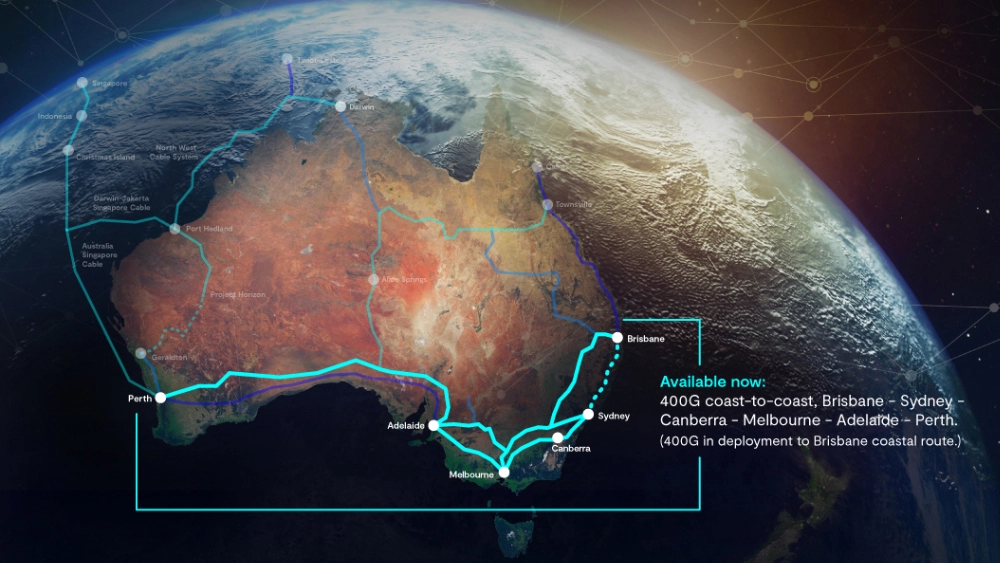 The image shows a view of Earth from space, focusing on the Australian continent. There is a highlighted route across Australia with labels indicating major cities such as Brisbane, Sydney, Canberra, Melbourne, Adelaide, and Perth. The route is marked as "Available now" and includes two segments: a 4,600 km coastal route from Brisbane to Sydney to Canberra to Melbourne to Adelaide to Perth and a 5,600 km deployment via the Brisbane coastal route. The background features a network of connected nodes representing global connectivity.