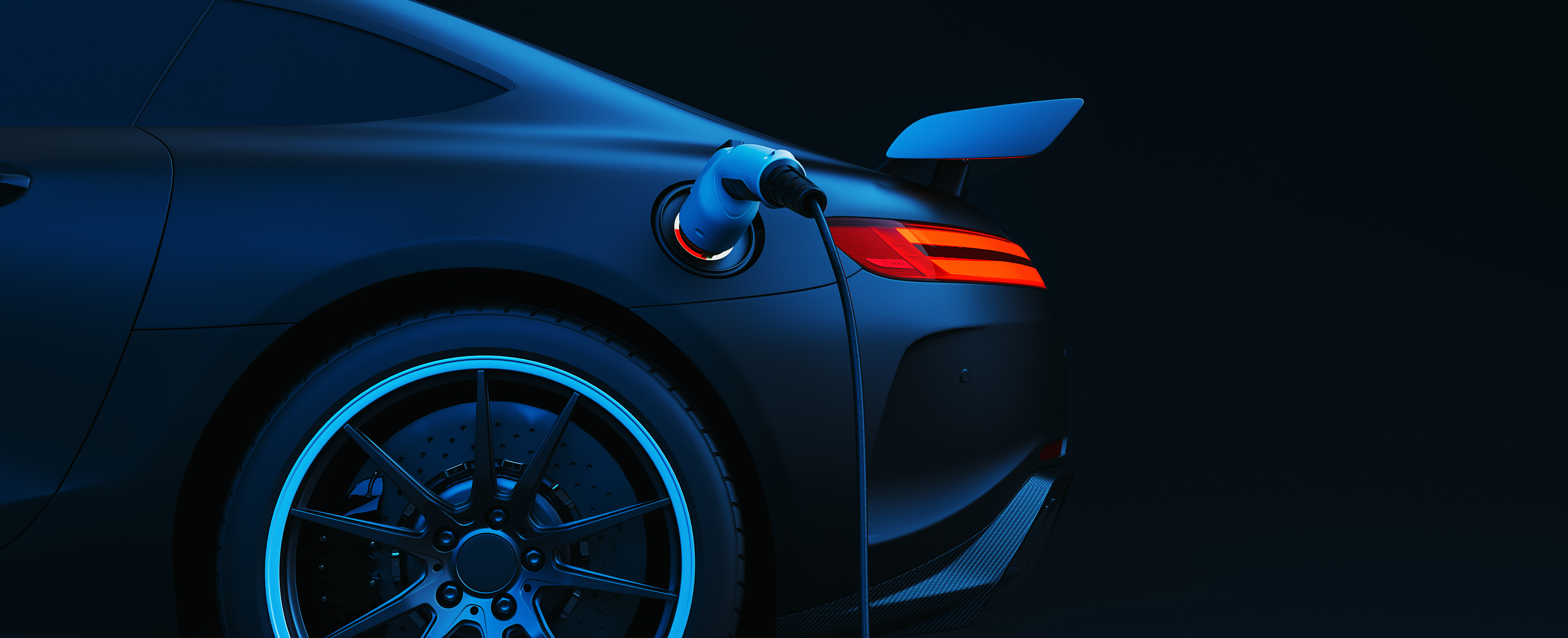 Sporty black EV on black background