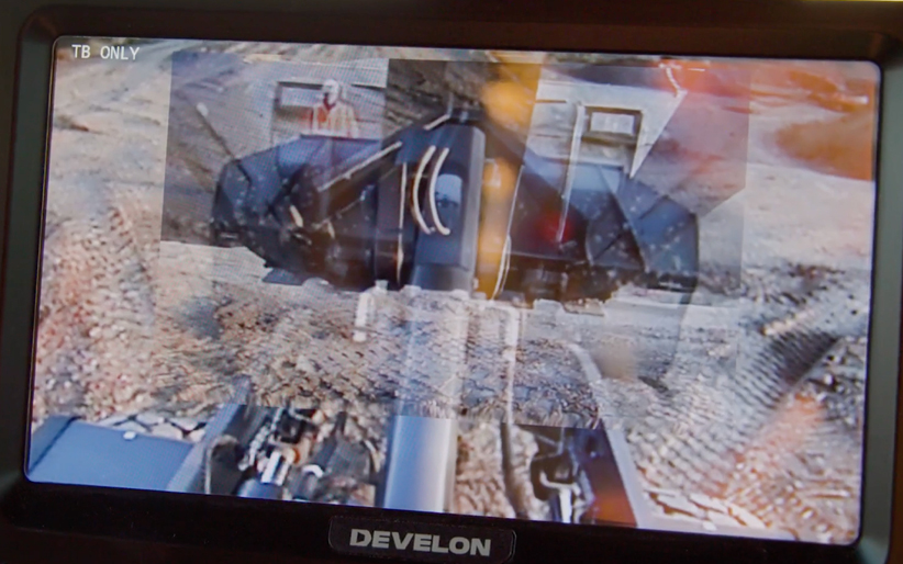 An operator’s view of the Transparent Bucket in a wheel loader, a feature that commands higher resale values.