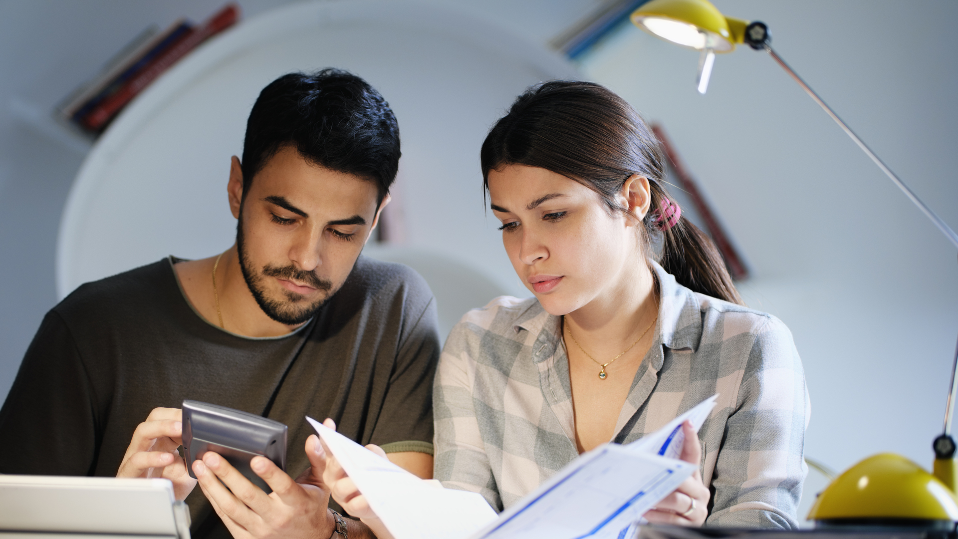 Man and Woman Worried For Taxes And Family Budget