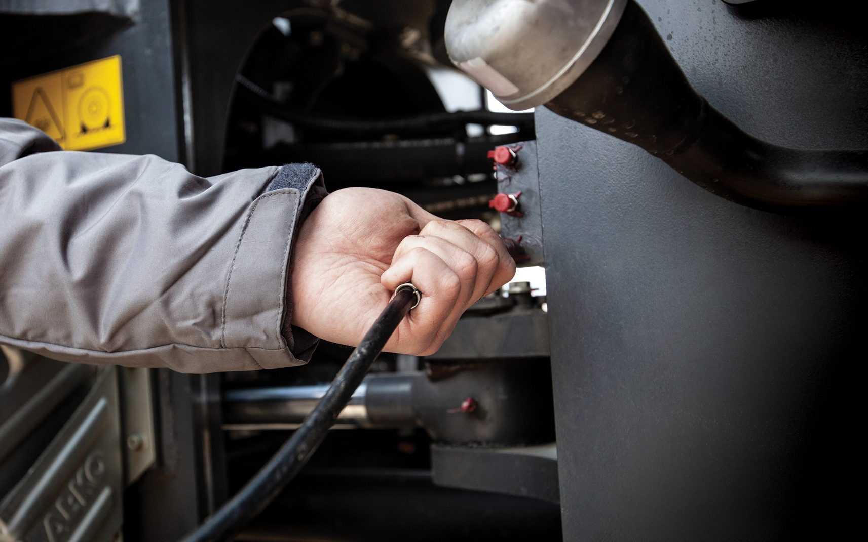 A centralized lubrication system makes it easy for operators to properly add grease to the machine.