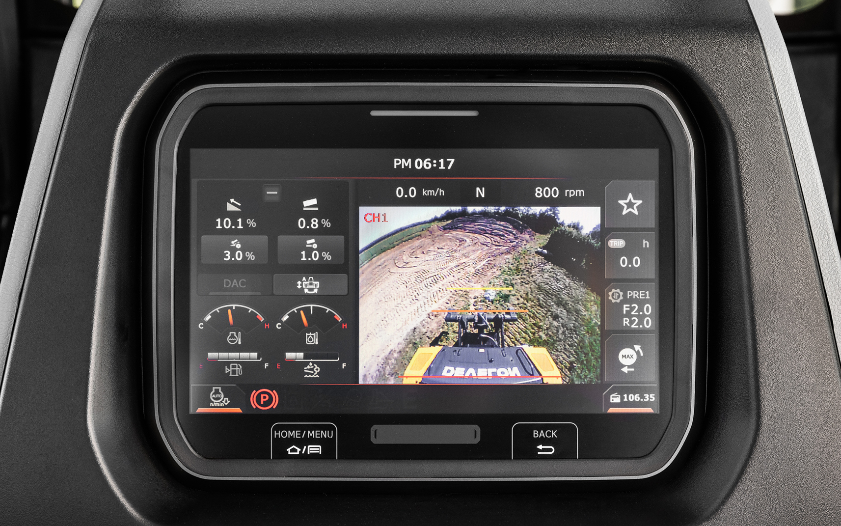 The standard rearview camera provides exceptional visibility behind the machine.