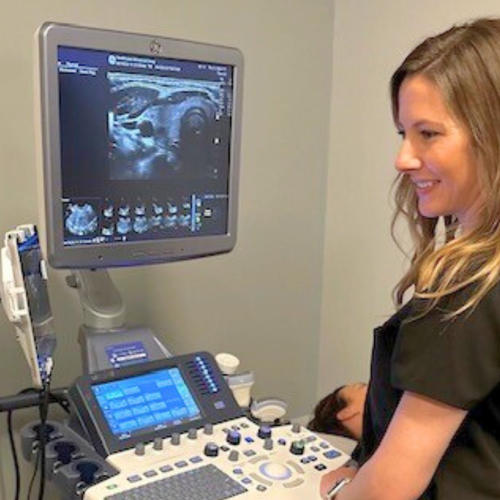 Sonographer utilizes remote telementored ultrasound during an ultrasound exam