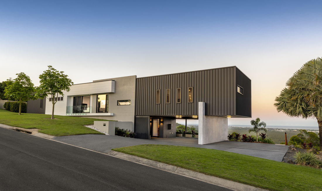 External Photo of house front with Clear evening sky 