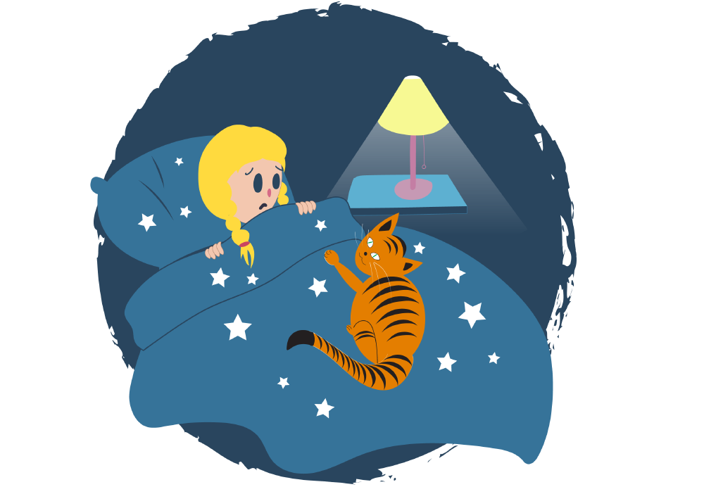 A child lying in bed at night looking worried with a cat on the bed and a lamp turned on.