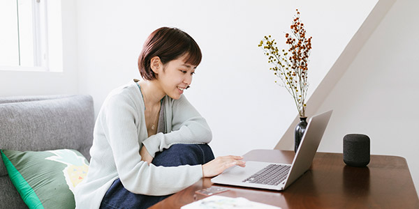 Asian woman on her laptop