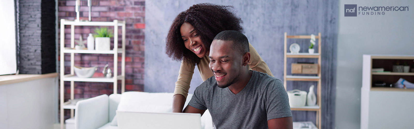 happy couple going over paperwork