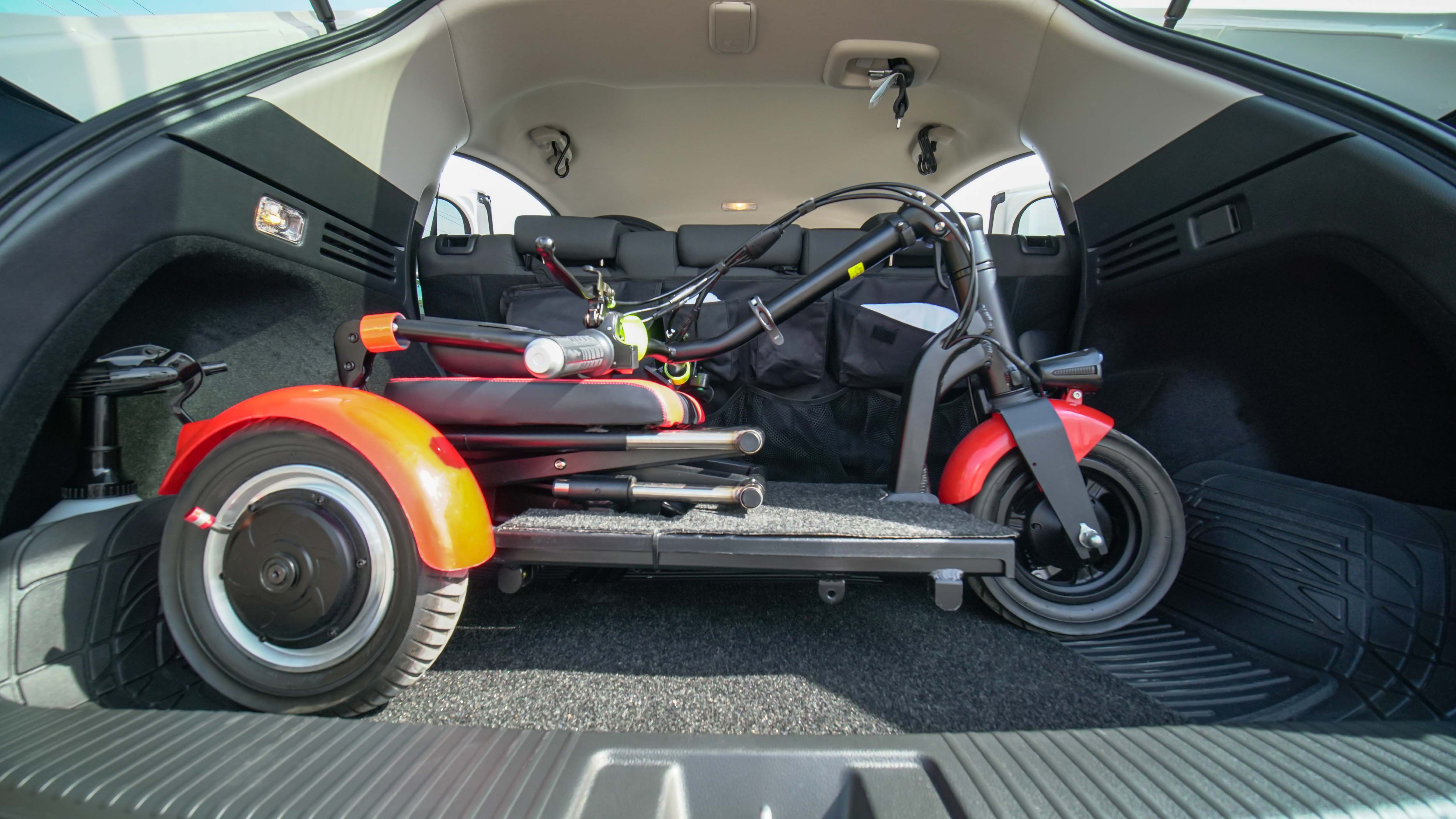 Foldable electric wheelchair inside a car