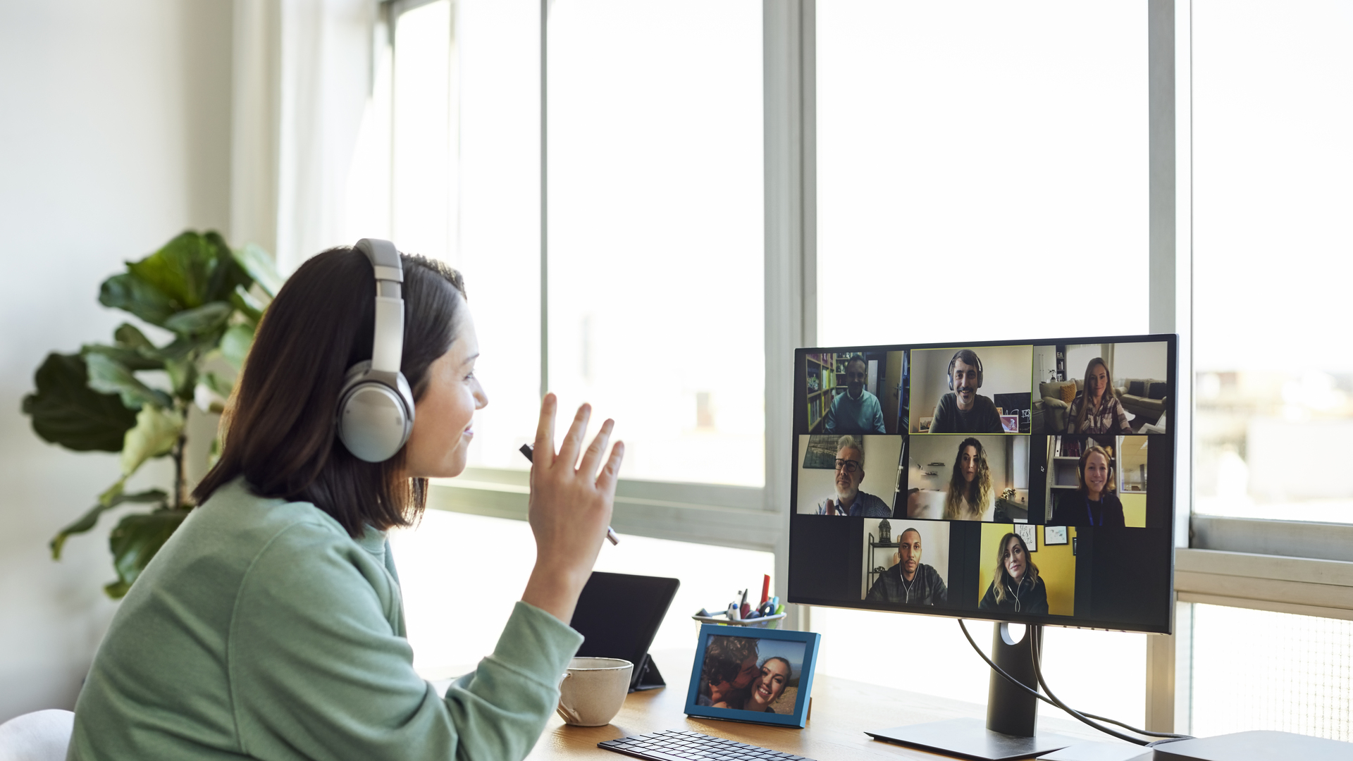 Businesswoman Discussing On Video Call In Home Office