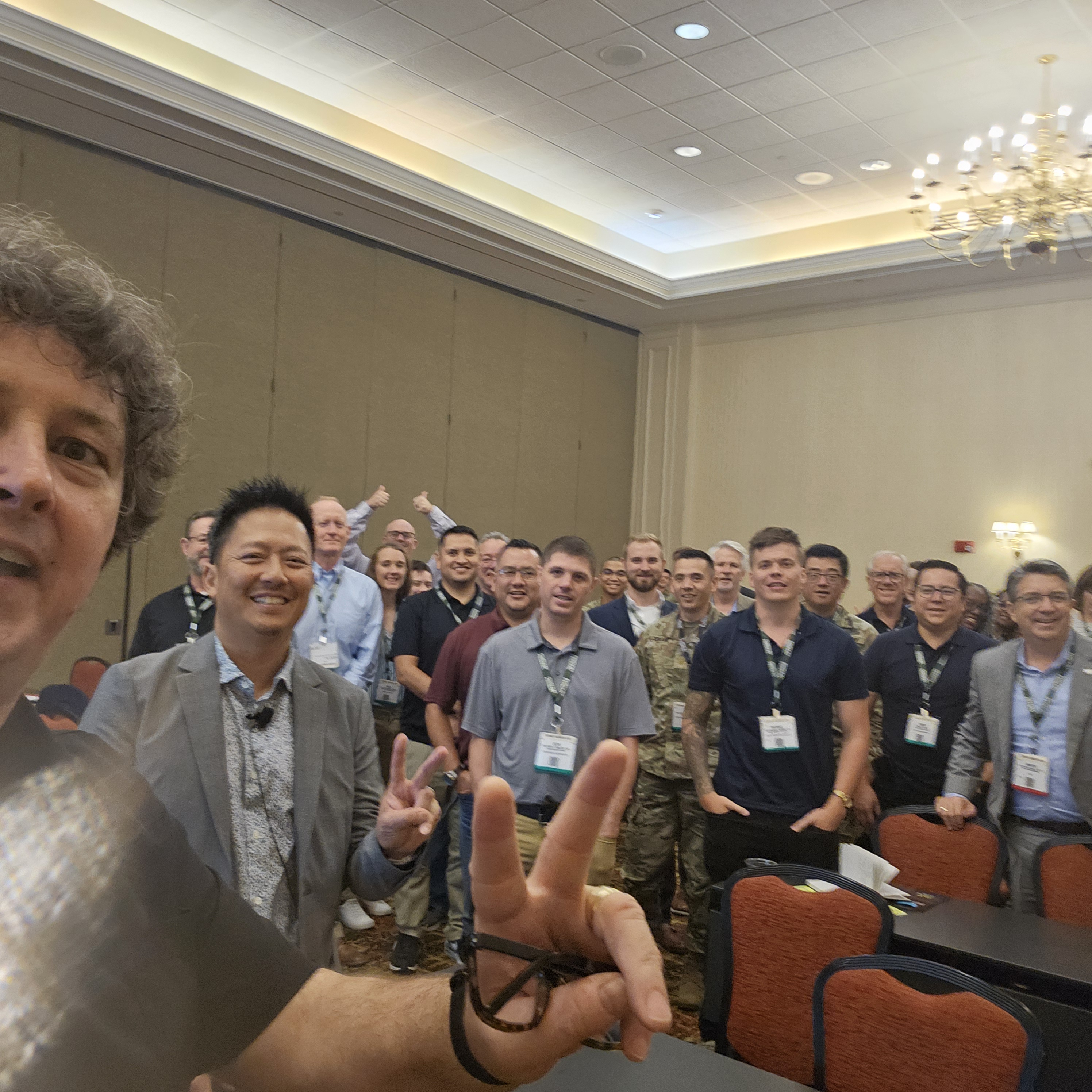 Selfie of James Stanger with group of learners