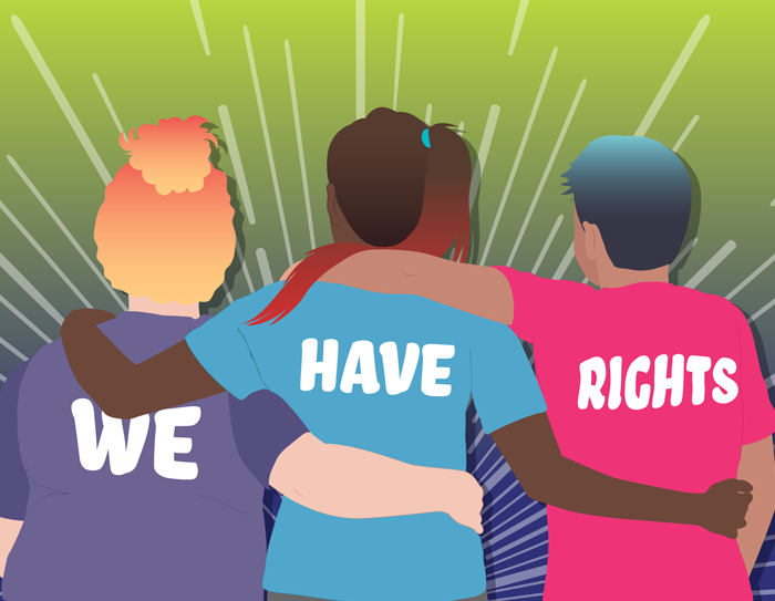 Three people stand together with their arms around each other. The backs of their shirts say "we have rights."
