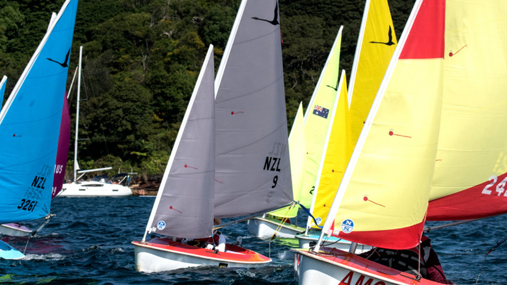 This is an image of Vocus' Gareth Bishop on the water in his yacht with other yachts in shot.