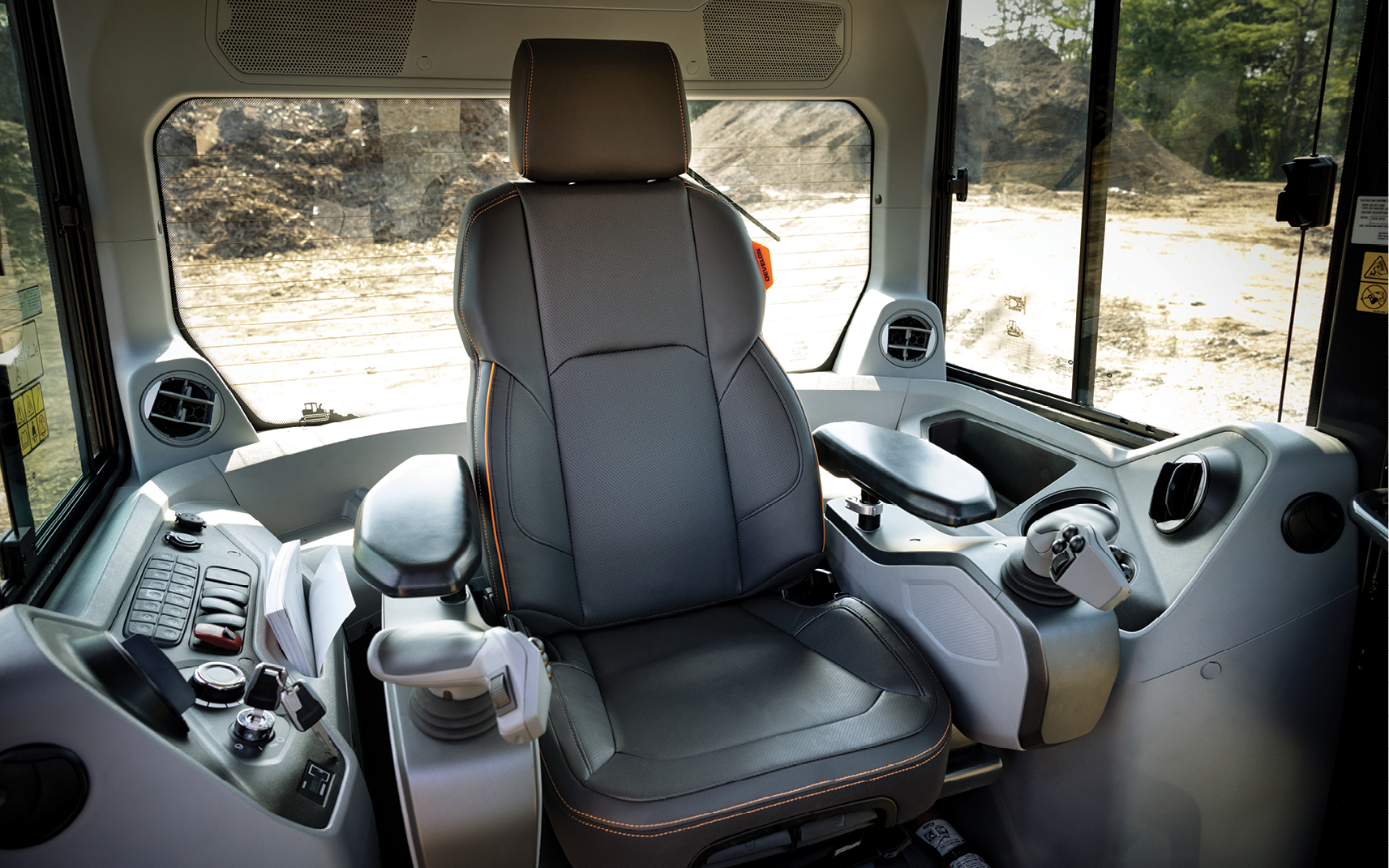 An air-suspension seat in the cab of a DEVELON dozer.