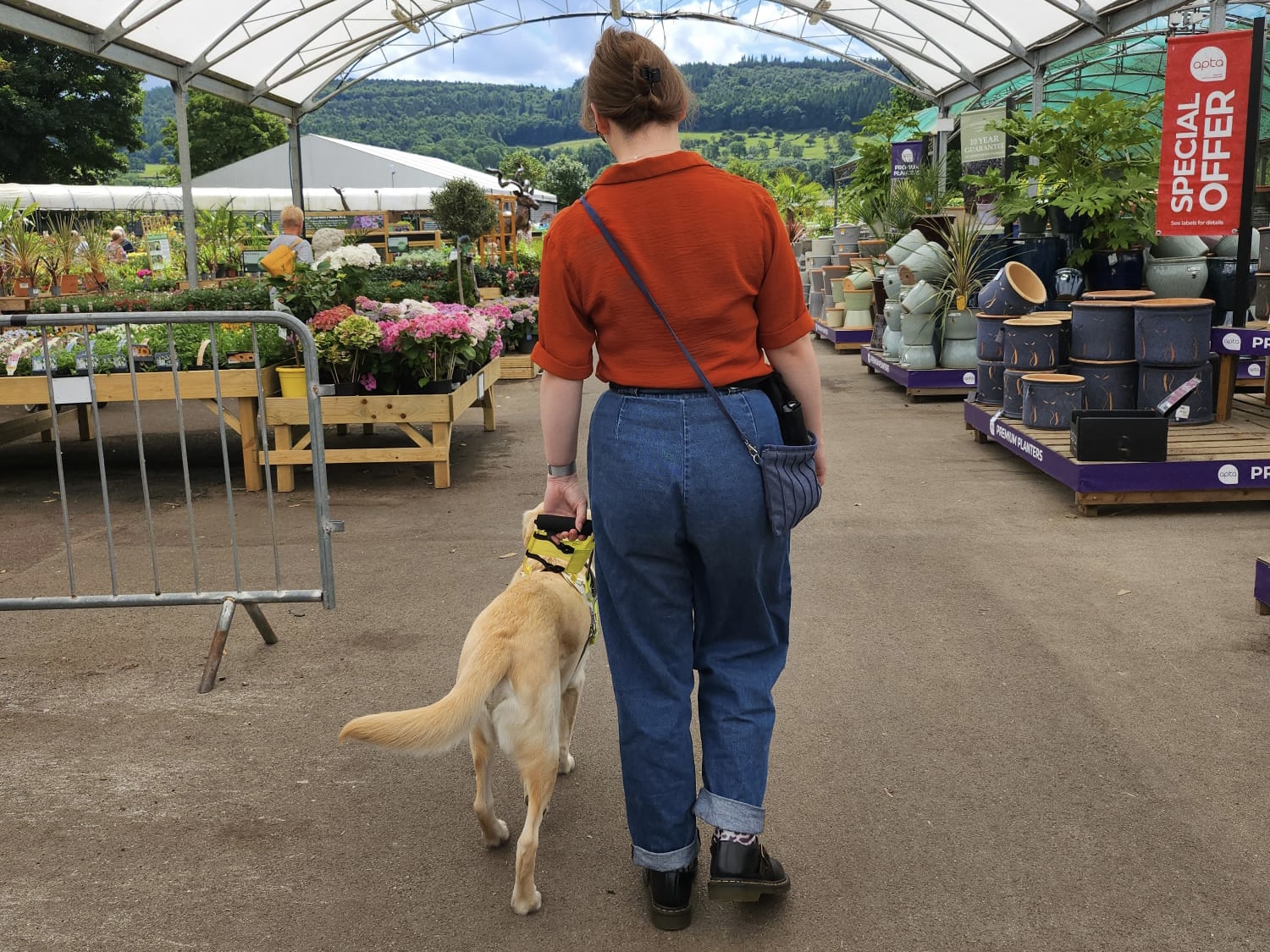 Chloe travelling with her guide dog Lezzie