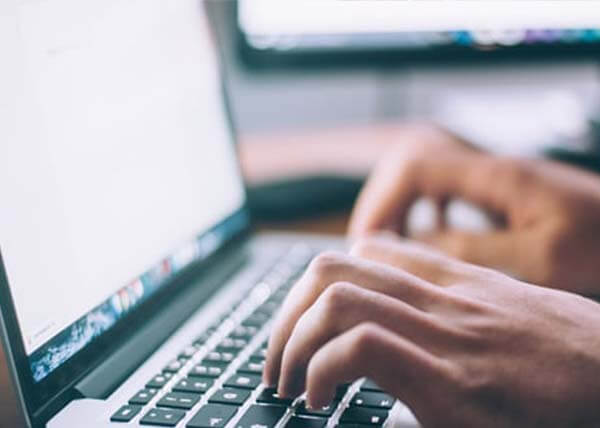 Zoomed in hands of George Clinical  working with PS Cloud