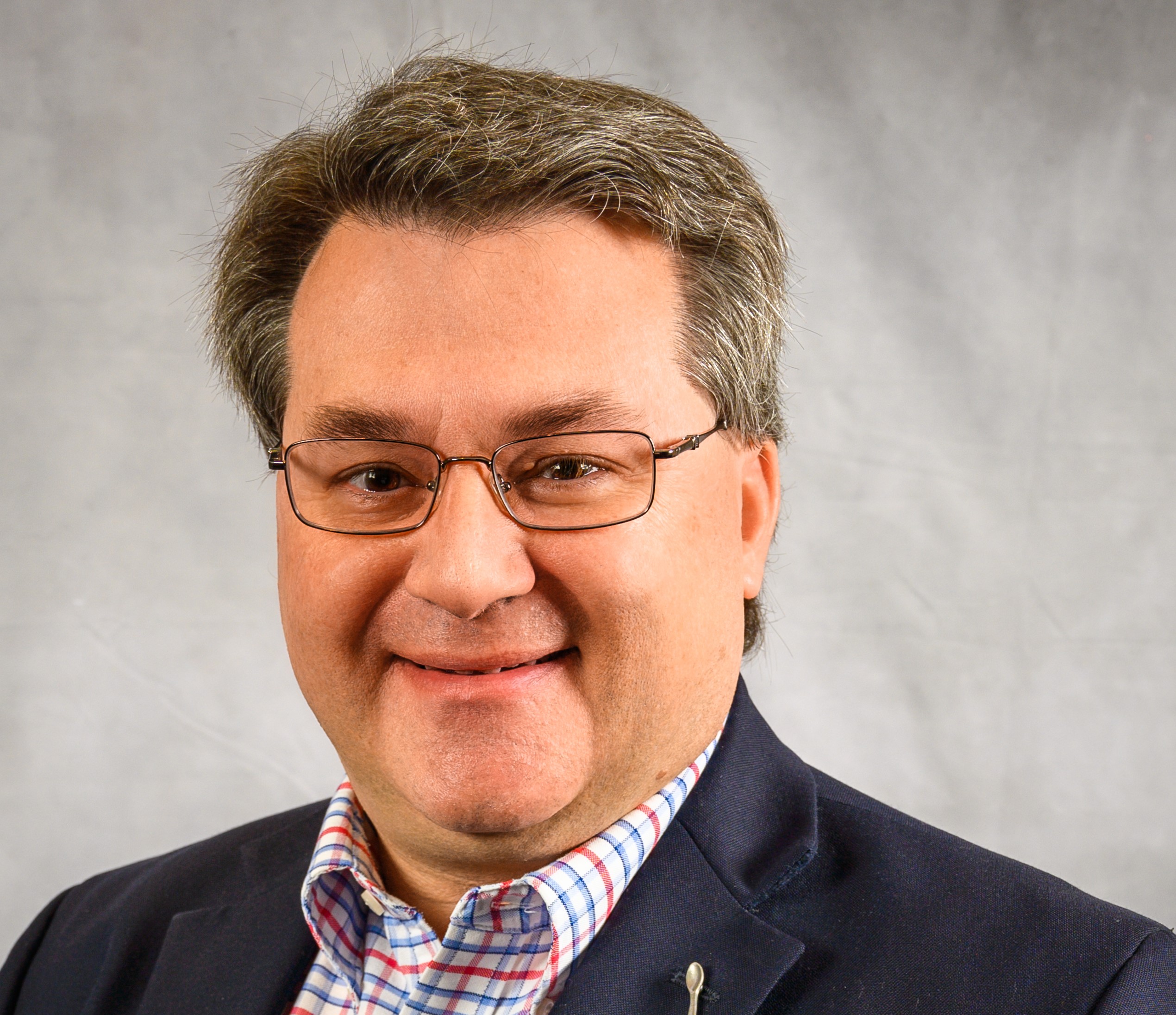 Professional headshot of Bradley S. Miller, MD, PhD