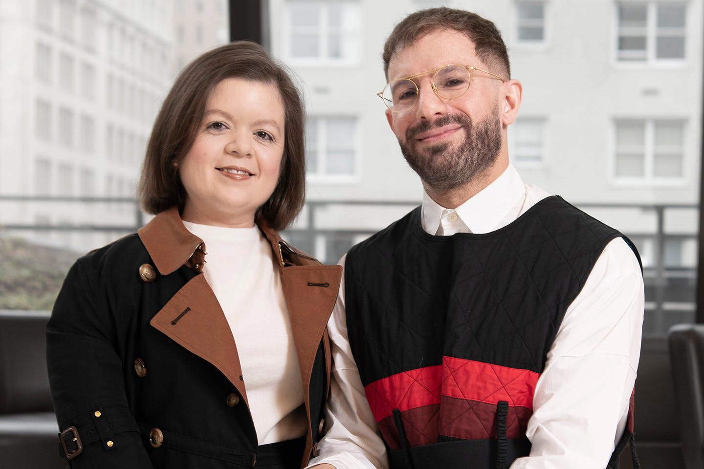 Sinéad Burke, a Little Person, and Ben Barry, dean of Parsons School of Fashion, posing together.