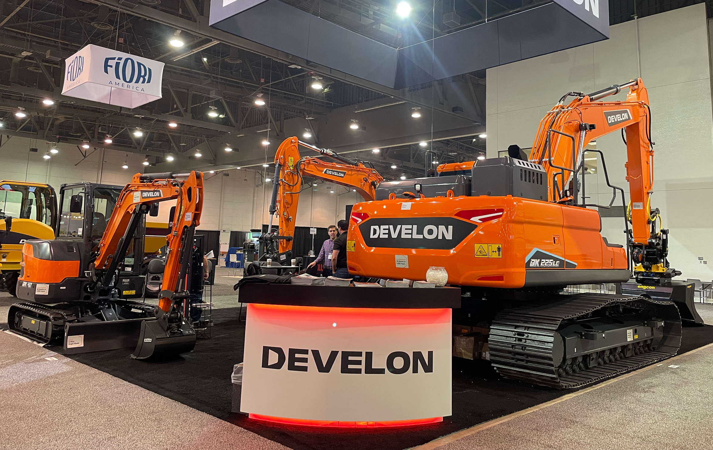 DEVELON DX225LC-7X crawler excavator and DX42-7 mini excavator on display at World of Concrete 2024.
