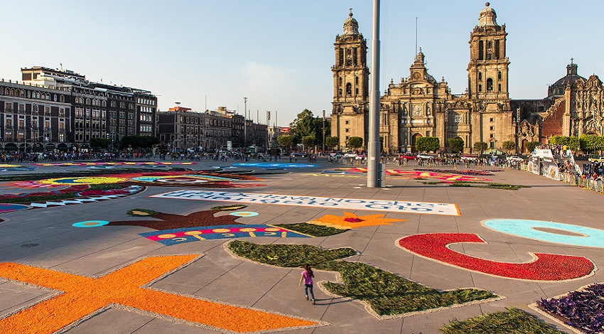A view of a Mexico City square with designs covering the ground