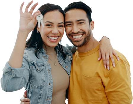 smiling couple holding house keys