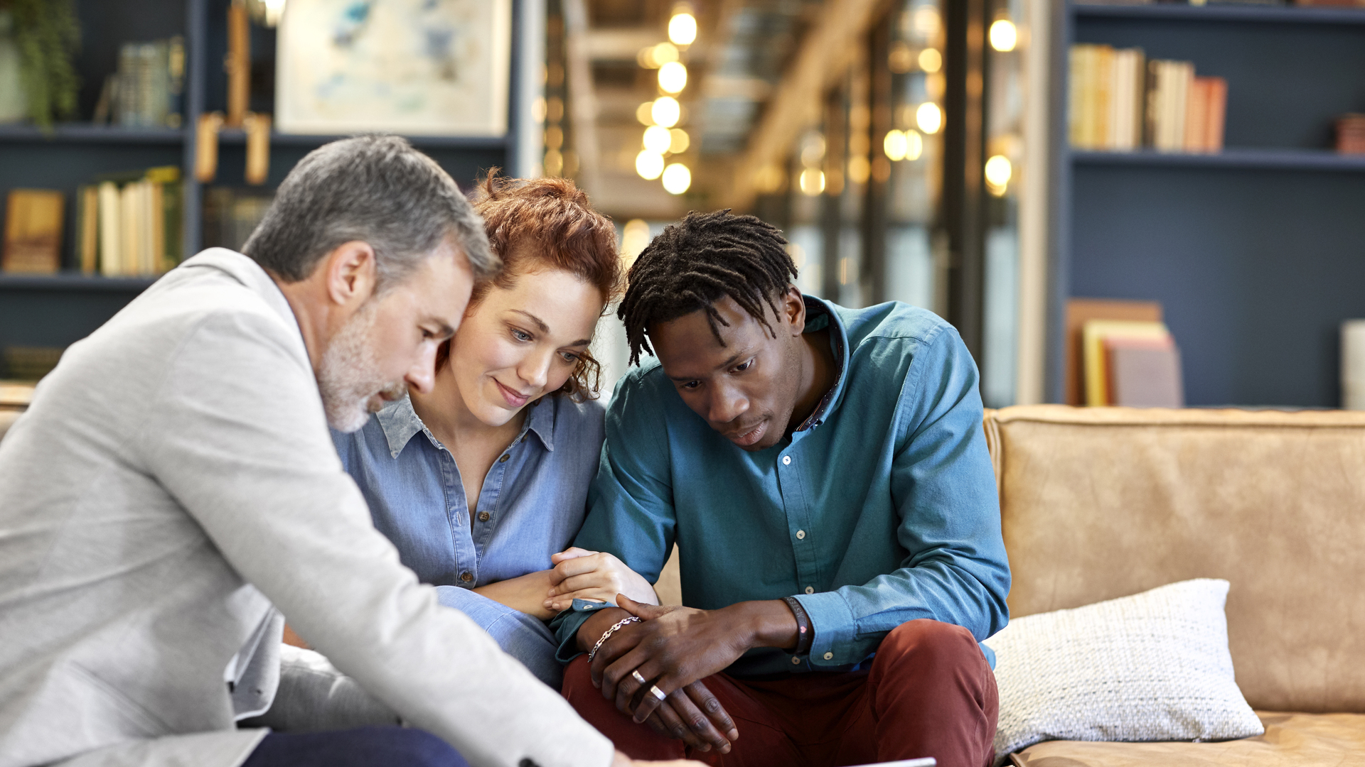 Financial advisor planning investment with couple