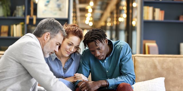 Financial advisor planning investment with couple