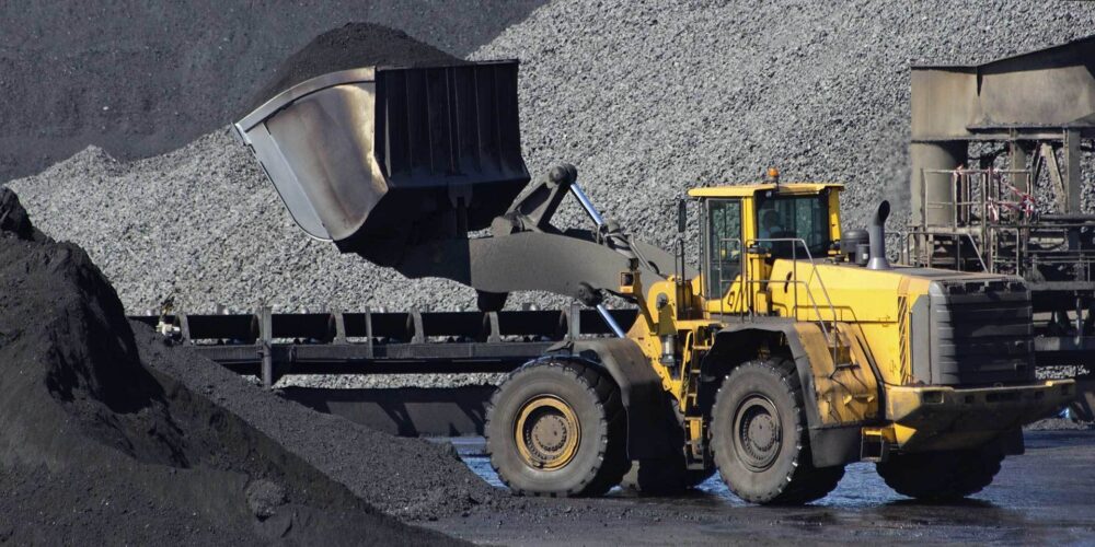 Image of a Coal Mining tractor hard at work in the mine