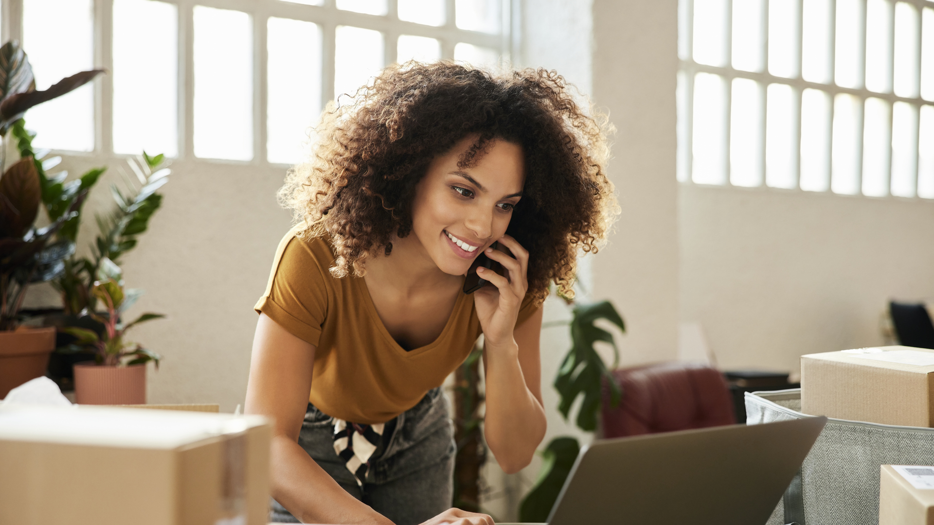 Entrepreneur Using Laptop At Home Office