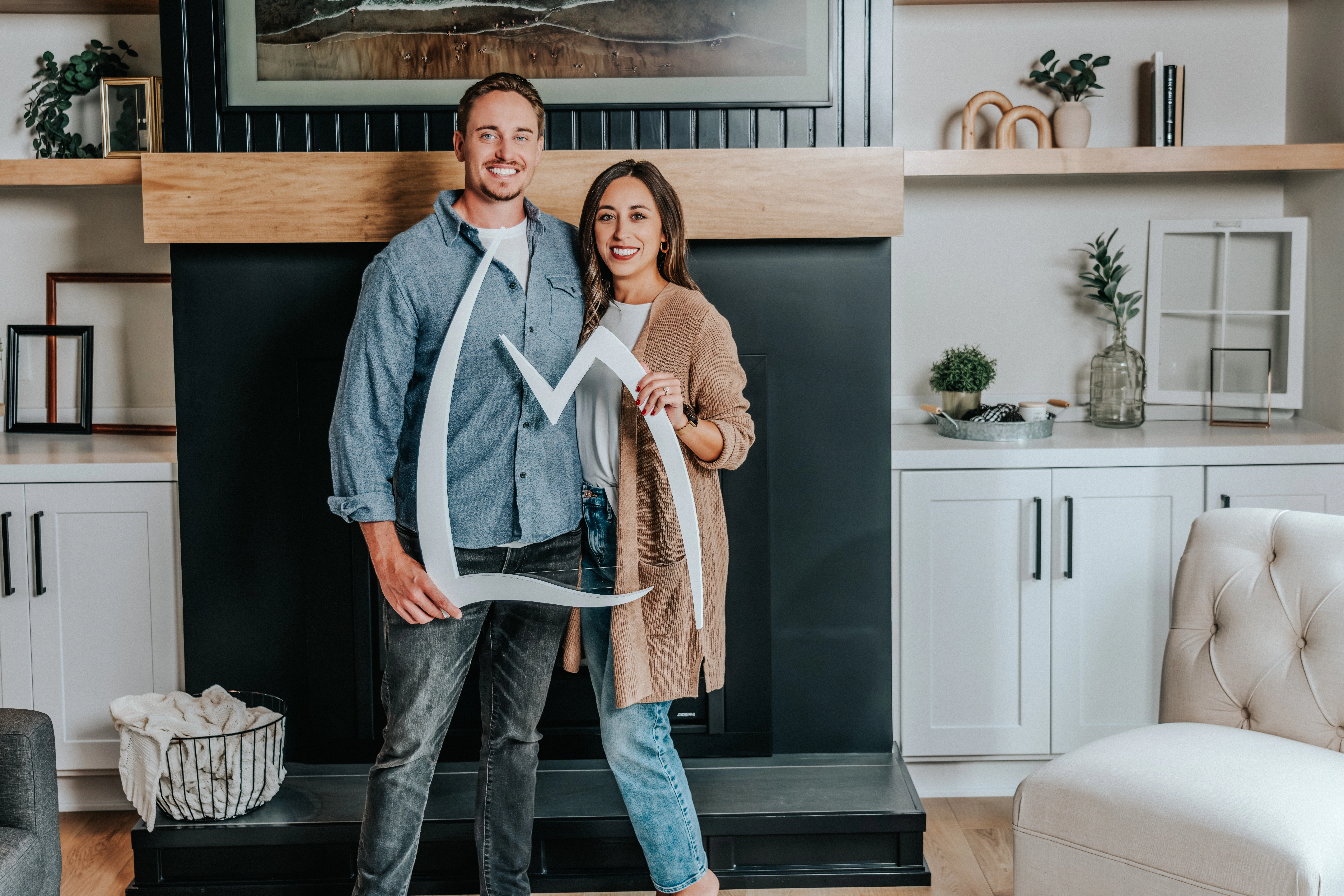 LMCU members standing in their living room