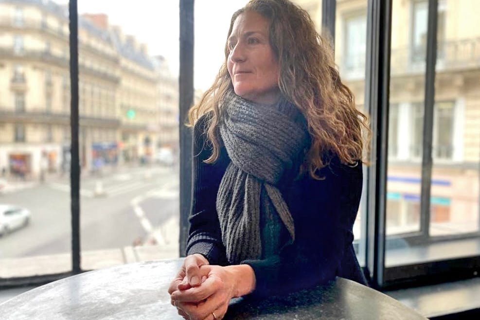 Program Director Bridget O'Rourke wearing a large scarf