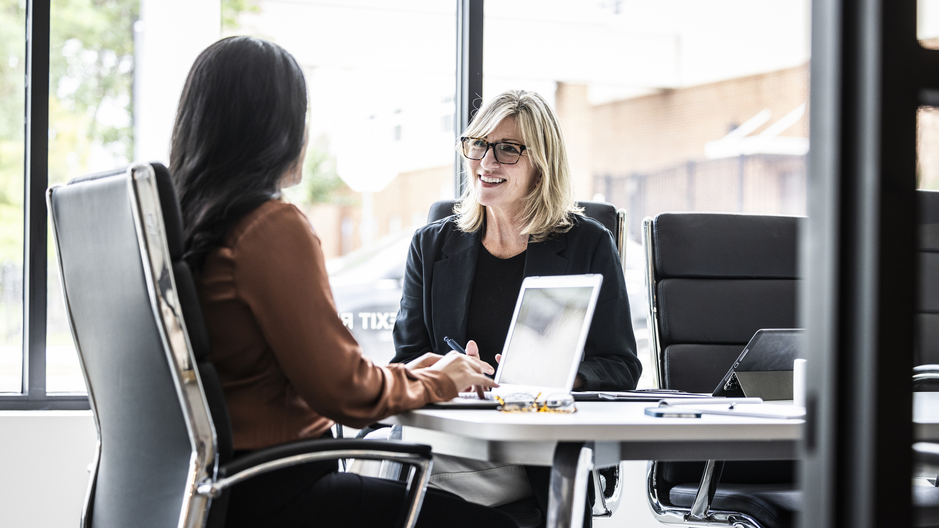 Businesswomen meeting in modern conference room
