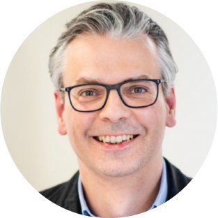 Professional headshot of Frank Behrens, MD.