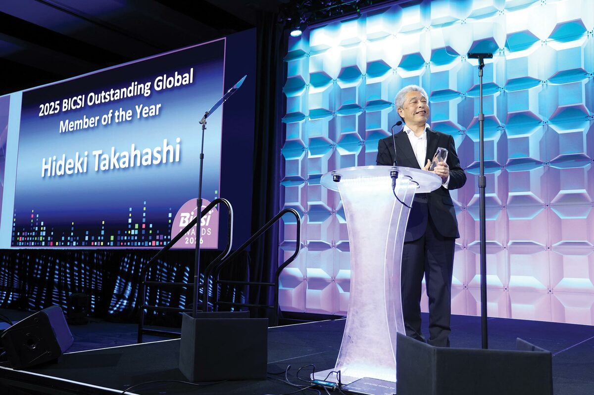 Hideki Takahashi accepting the 2025 BICSI Outstanding Global Member of the Year award at conference ceremony