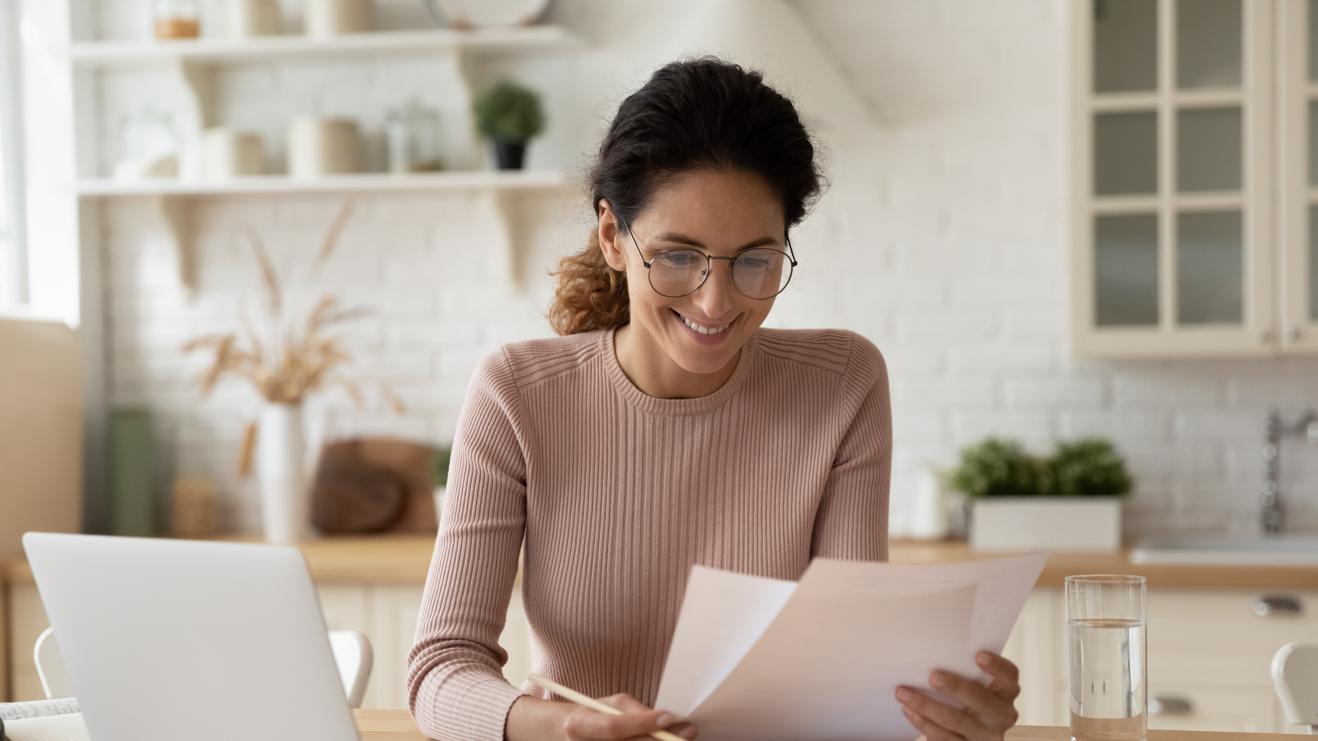 Happy millennial hispanic lady review printed paper documents financial reports