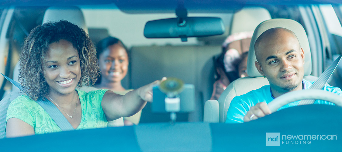 black family on a drive in their car