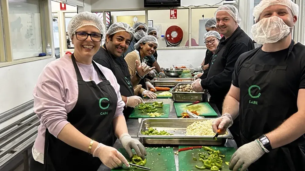 Photo of Vocus volunteers in the kitchen
