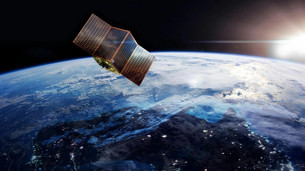 Stock image of Satellite from space. Earth in background