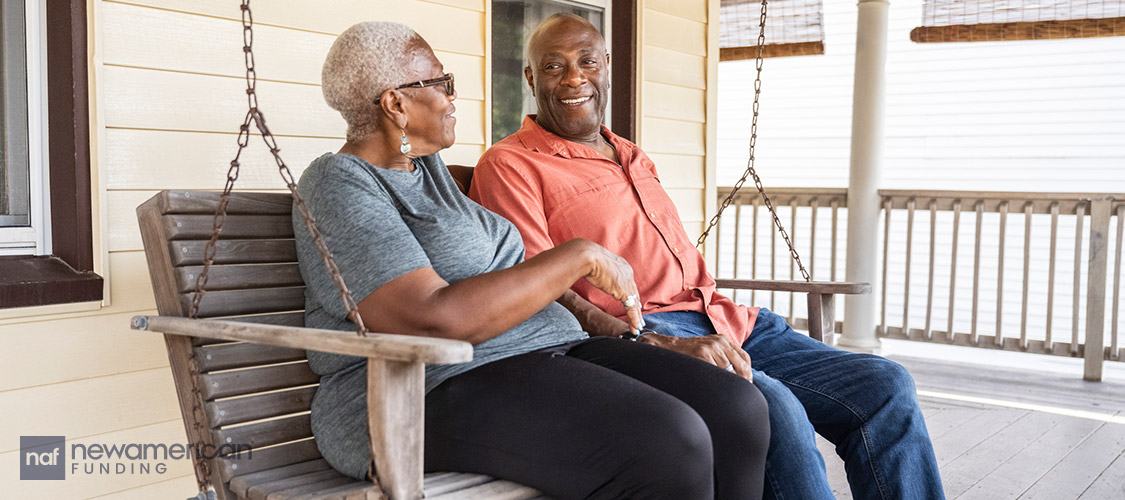 couple sititng on the porch swing