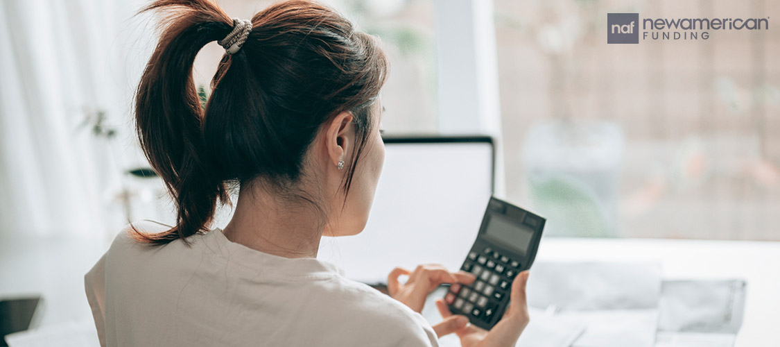 woman using a calculator