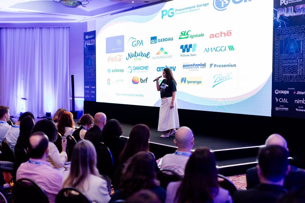 Speaker on stage presenting CIPS And PG consulting at the Pulse conference
