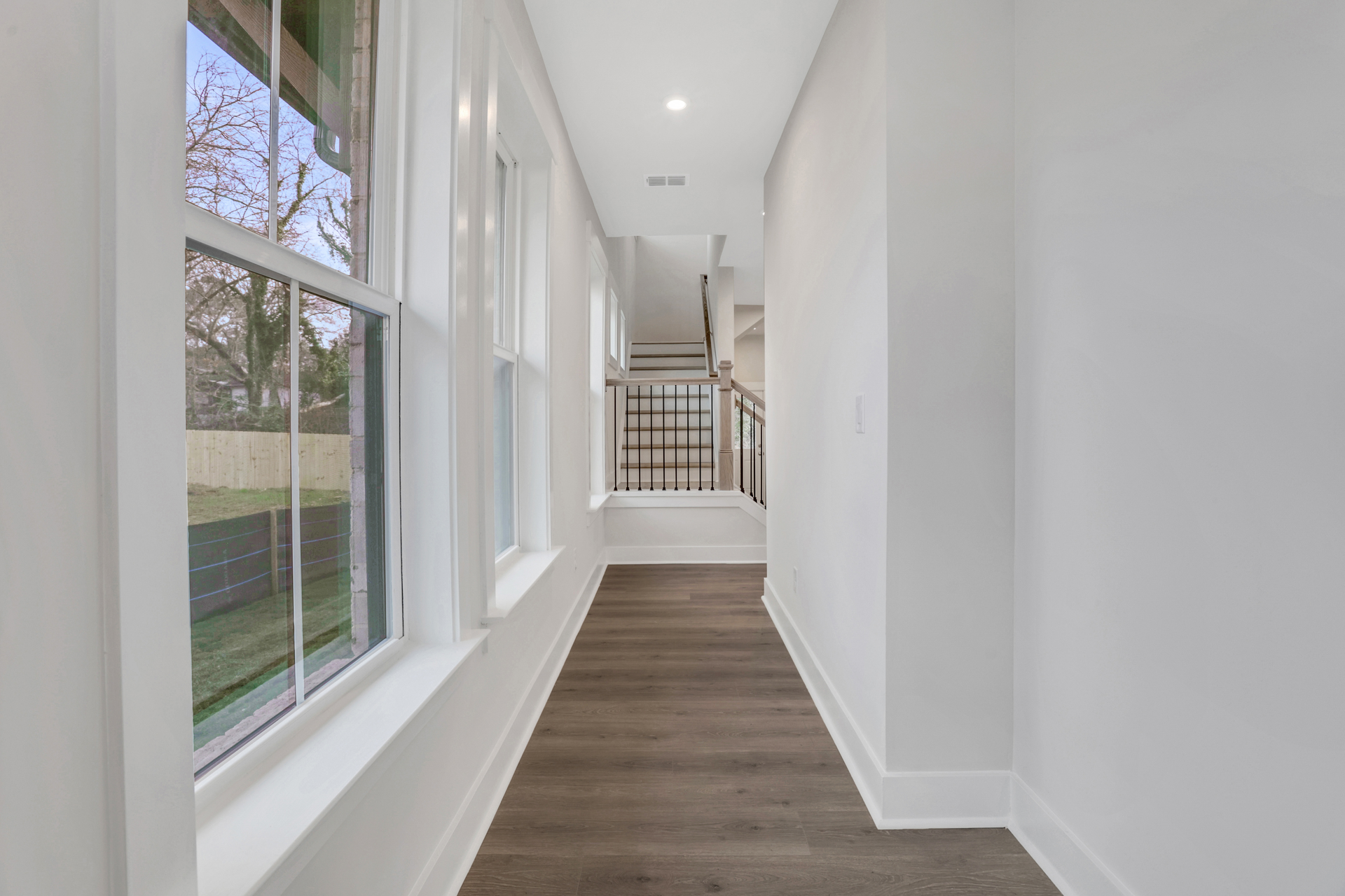 entry to townehome with hard surface flooring 