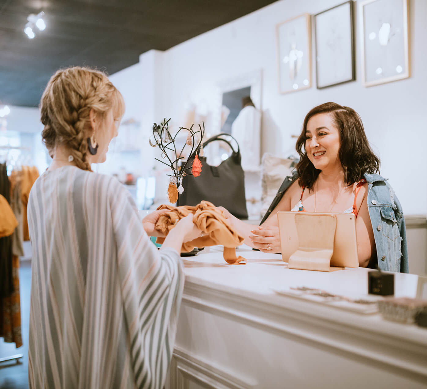 Female shopper making a store transaction