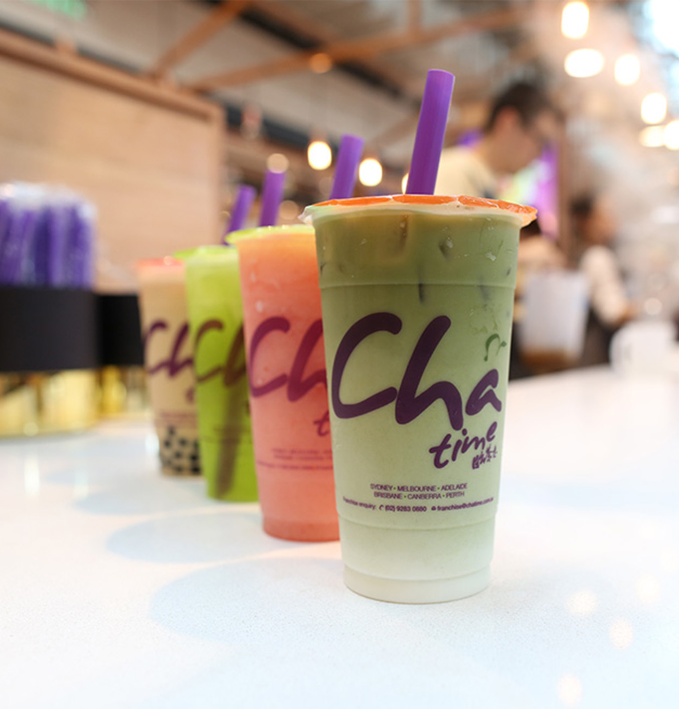 Chatime iced tea cup on a vibrant background