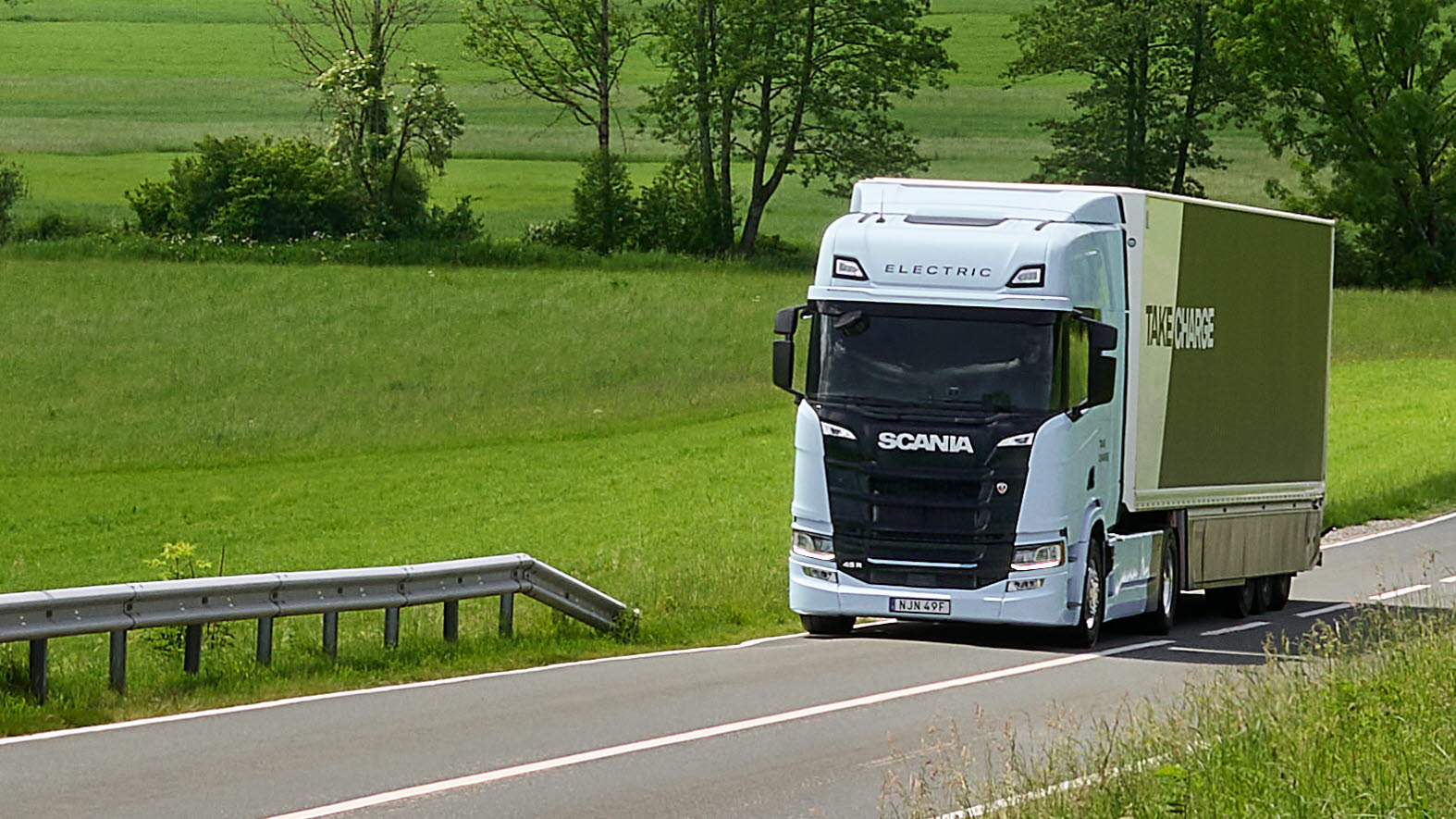 An electric vehicle from Traton Group (Scania) on the road.