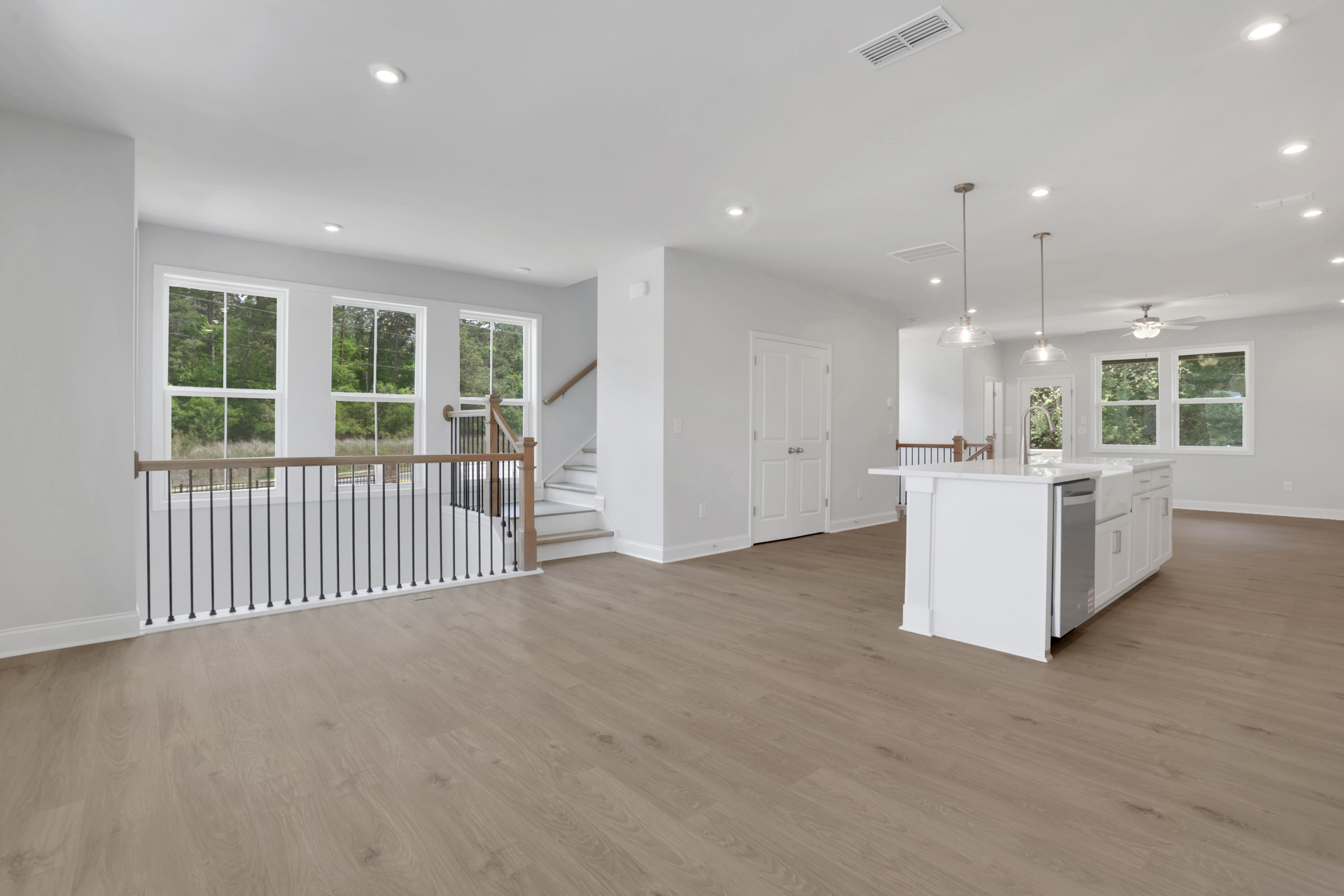 dining room with hard surface flooring and windows