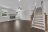 great room with electric fireplace and hard surface flooring