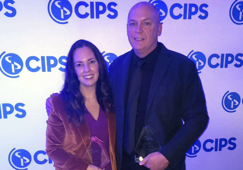 The two individuals are attending the CIPS (Chartered Institute of Procurement & Supply) Awards. This is a prestigious event within the procurement and supply chain industry, often referred to as the 
