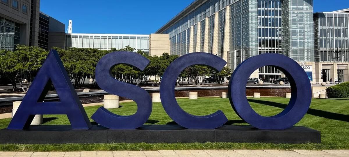 the letters ASCO out front of McCormick Place in Chicago